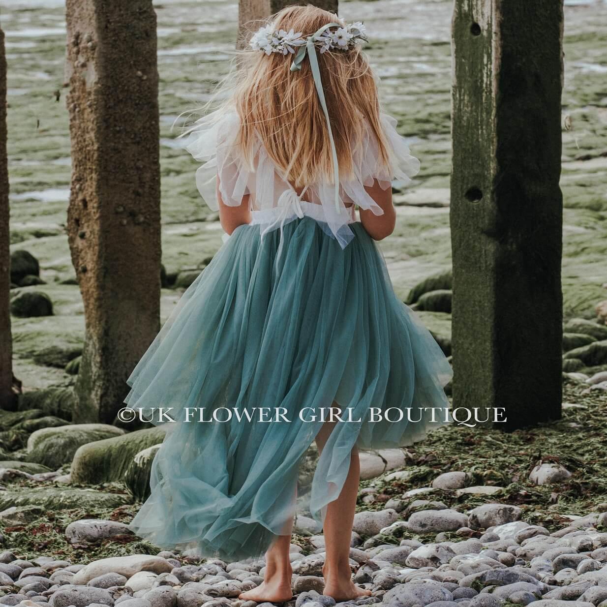 Girl at beach in pretty dress