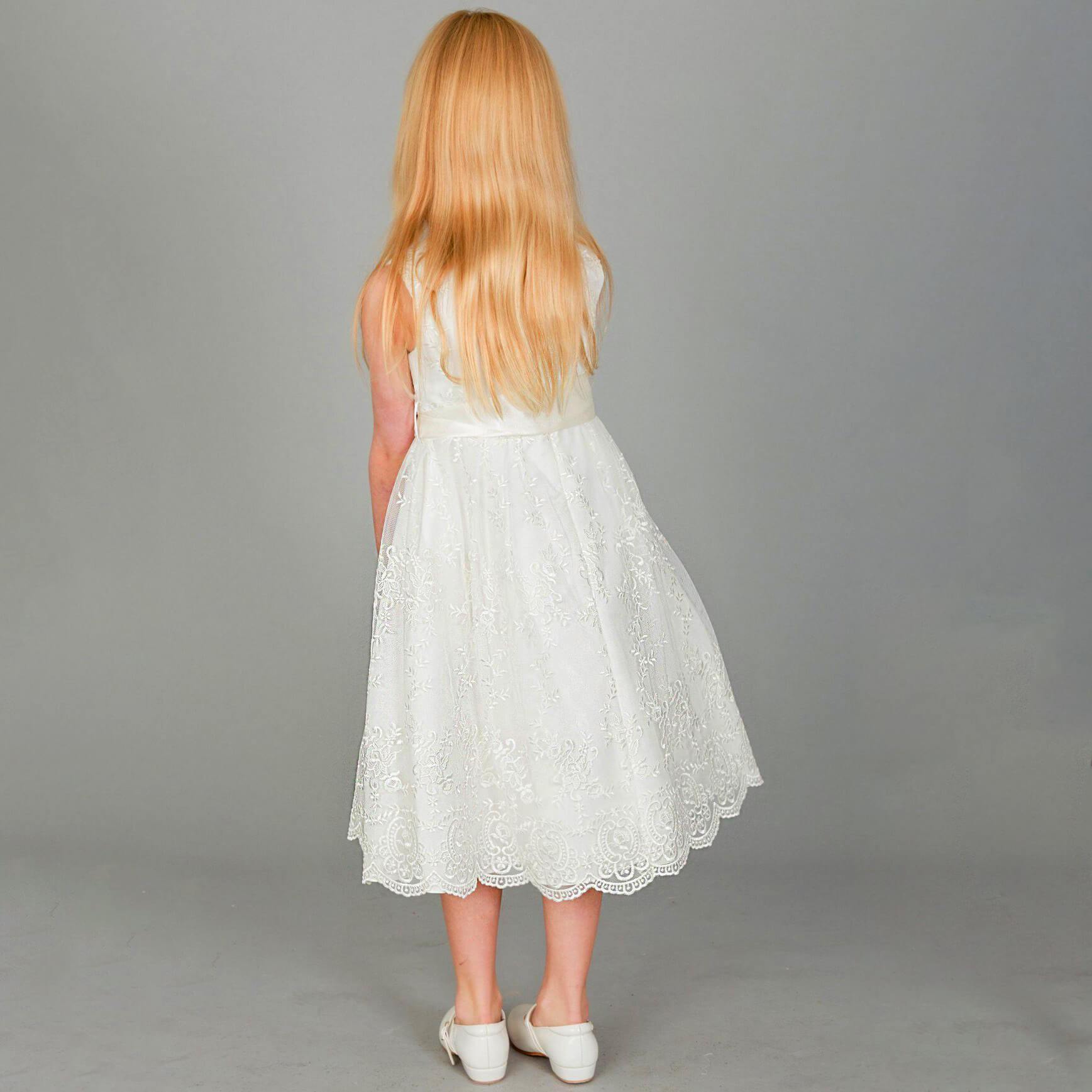 Blond girl in flower girls dress