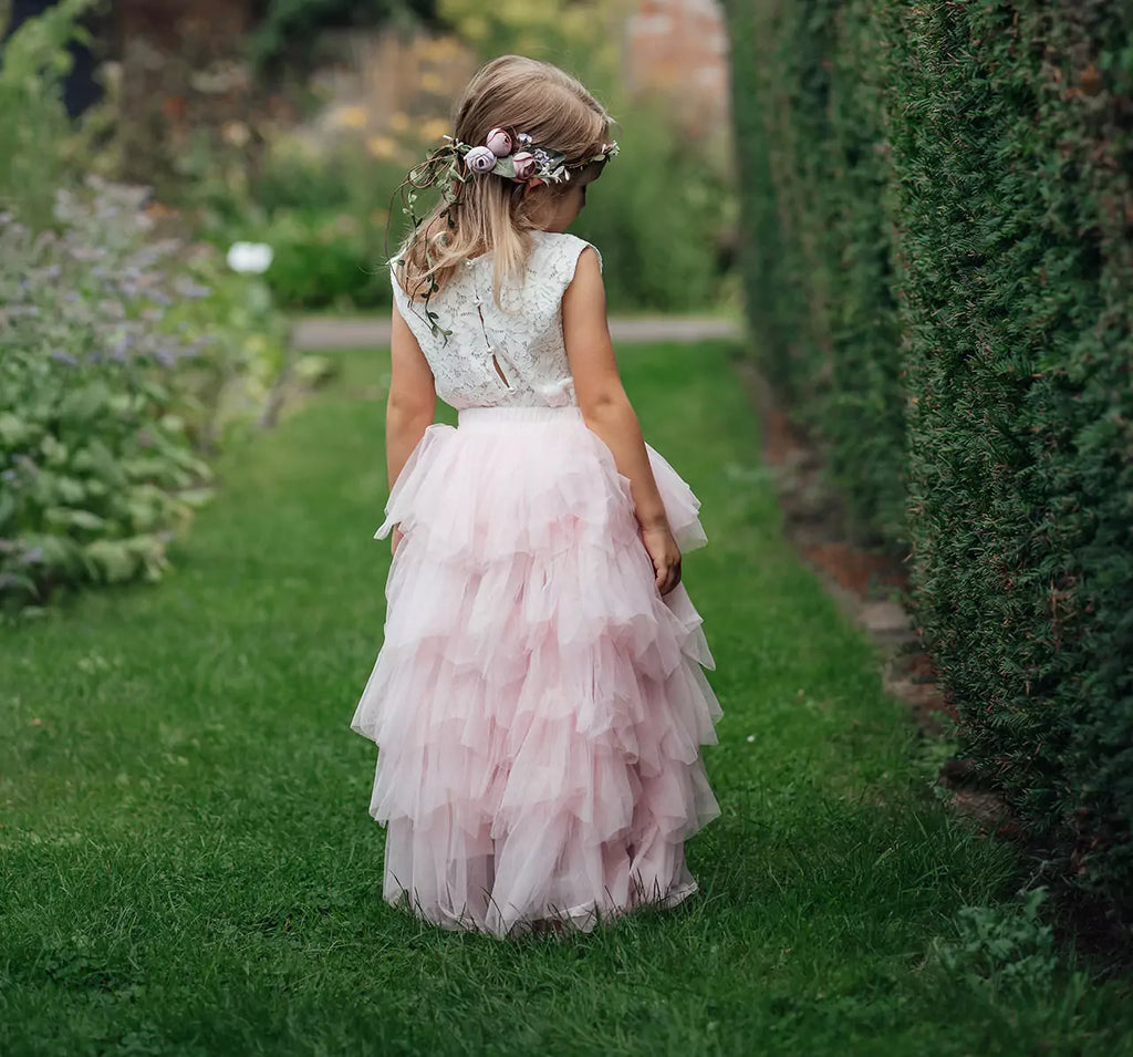 younger girl wearing pretty dress