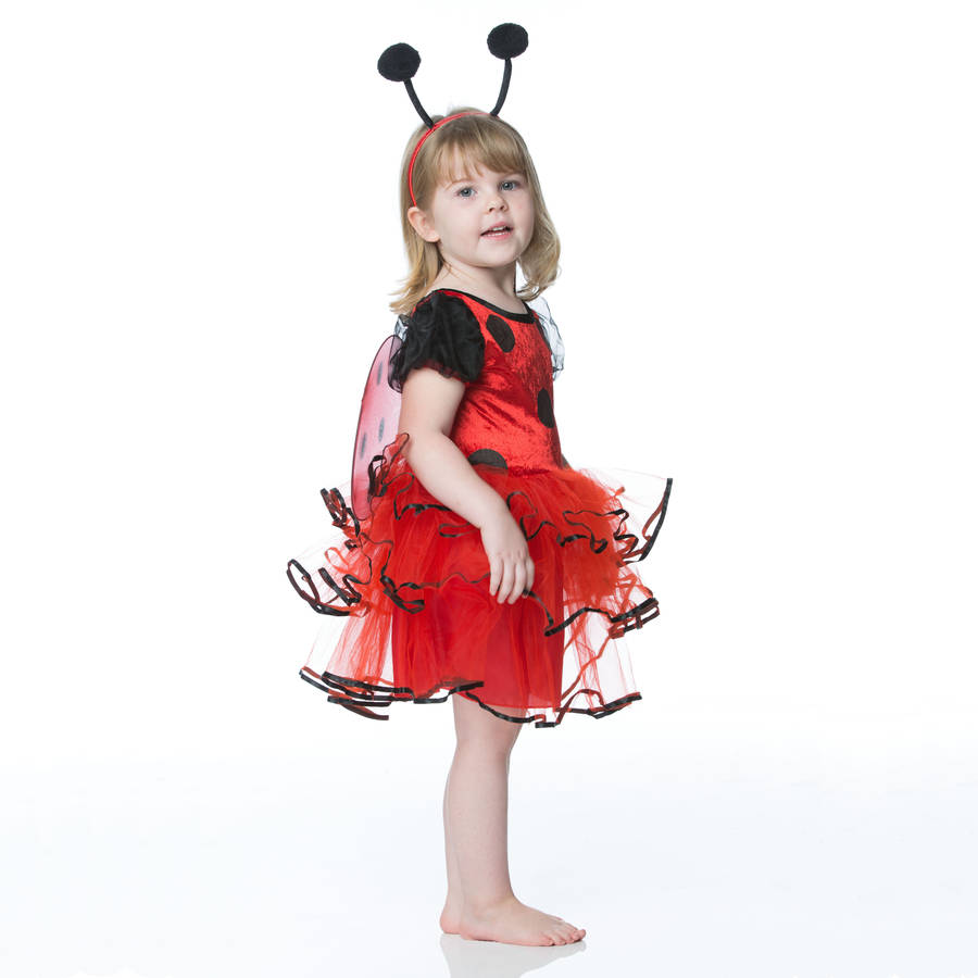 Girl wearing a red and black Ladybug costume Edit alt text