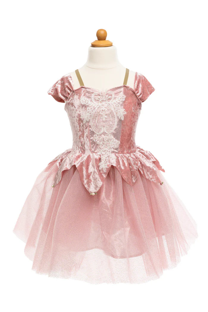 Pink lace dress on a mannequin against a white background