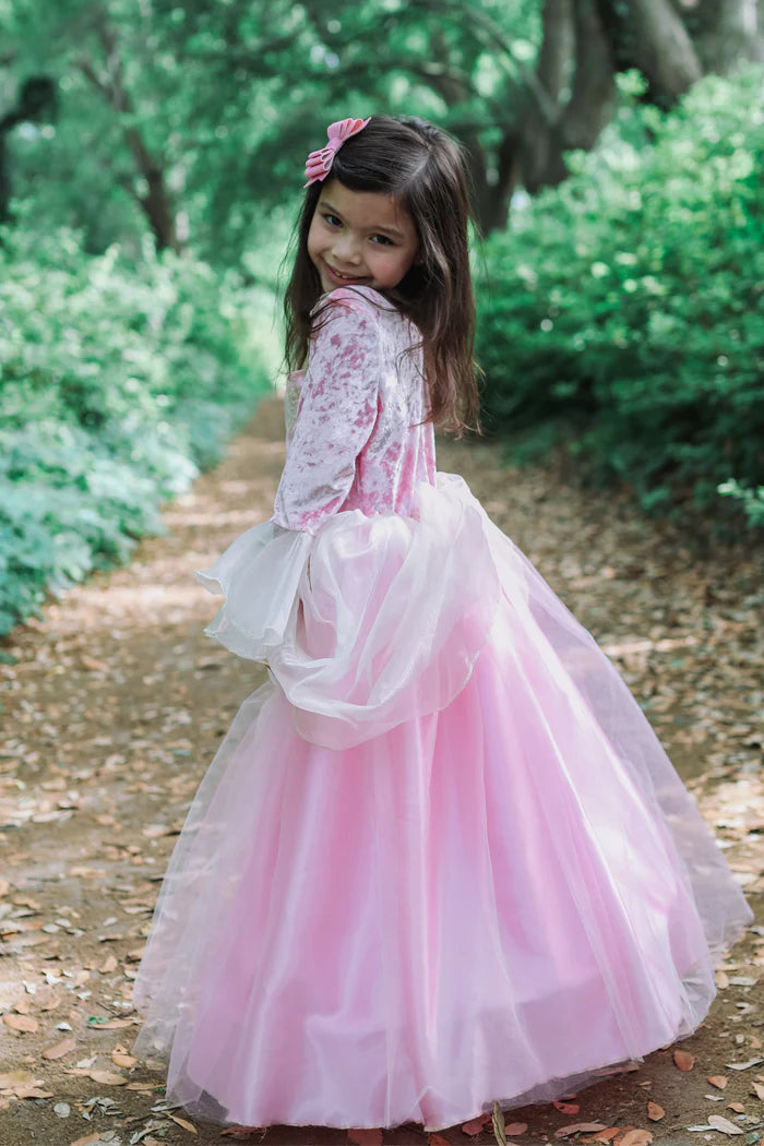 young girl playing in princess dress