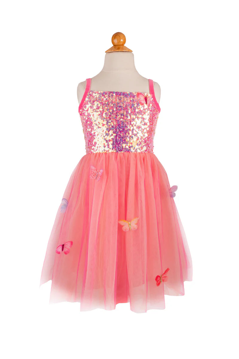 Pink sequin dress with butterfly details on a mannequin against a white background