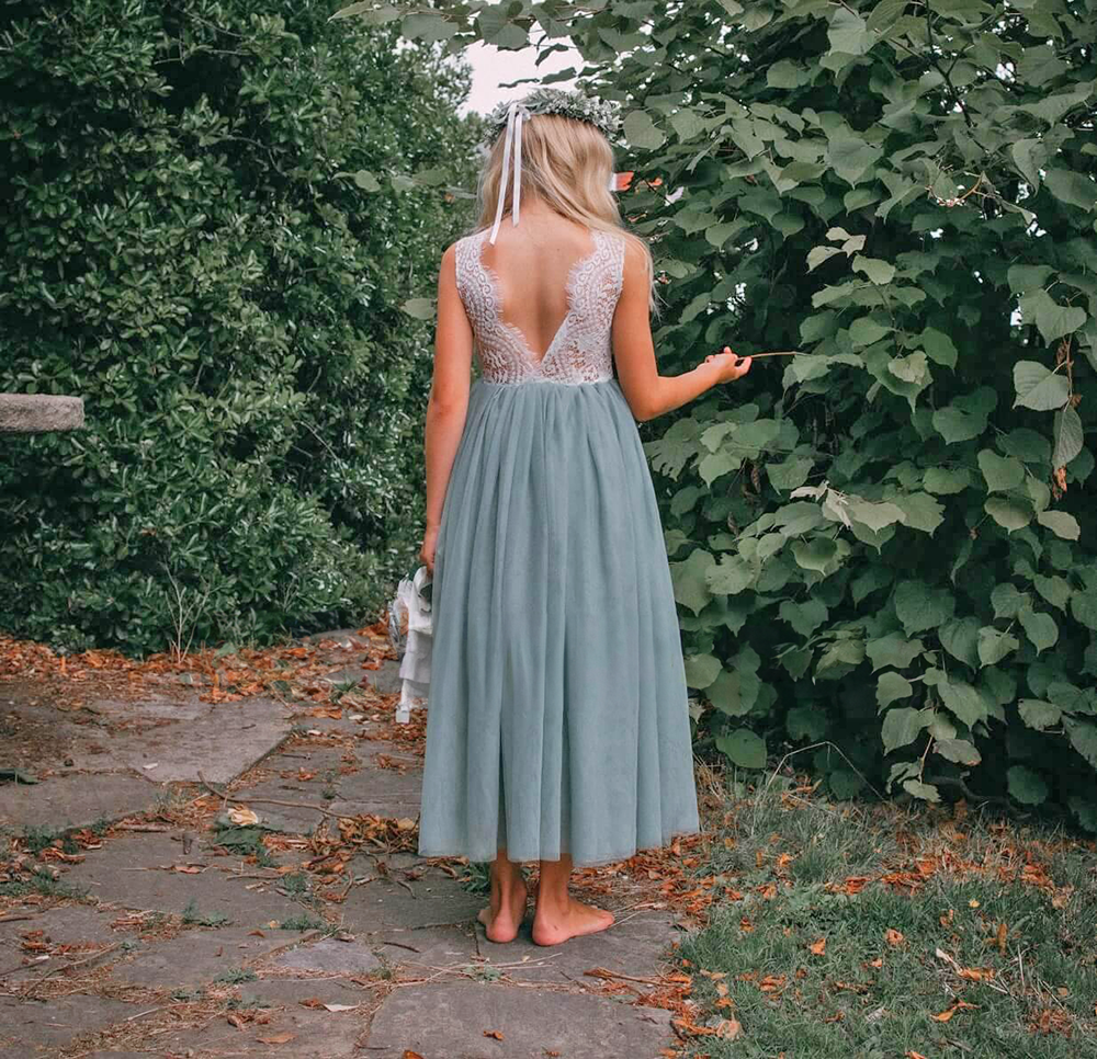 Girl wearing a pretty dress in a park