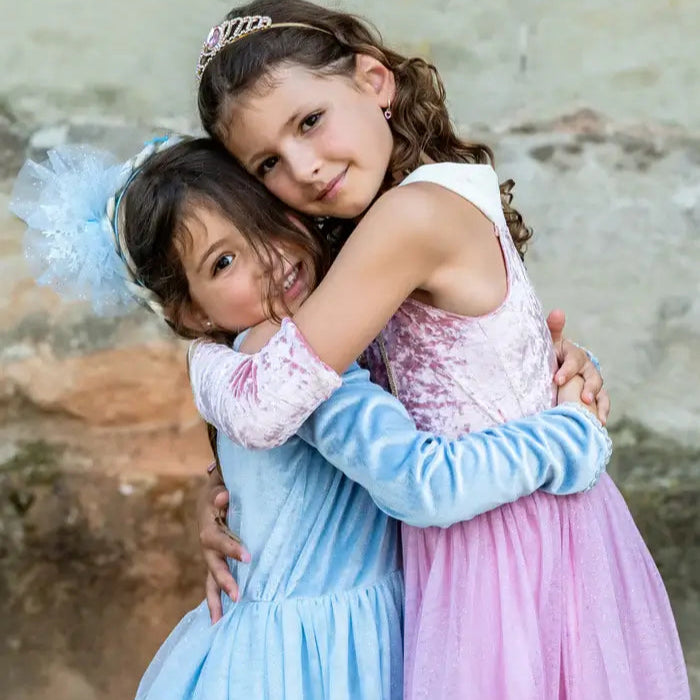Girls playing dressed as princesses
