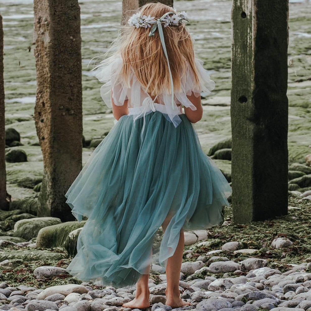 girl wearing a sage Bohemian Serendipity Dress