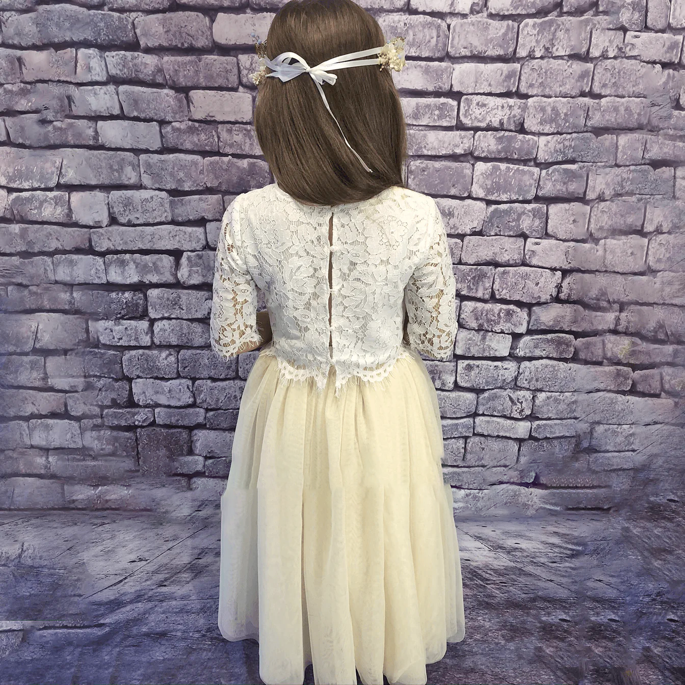 Back of ivory party outfit