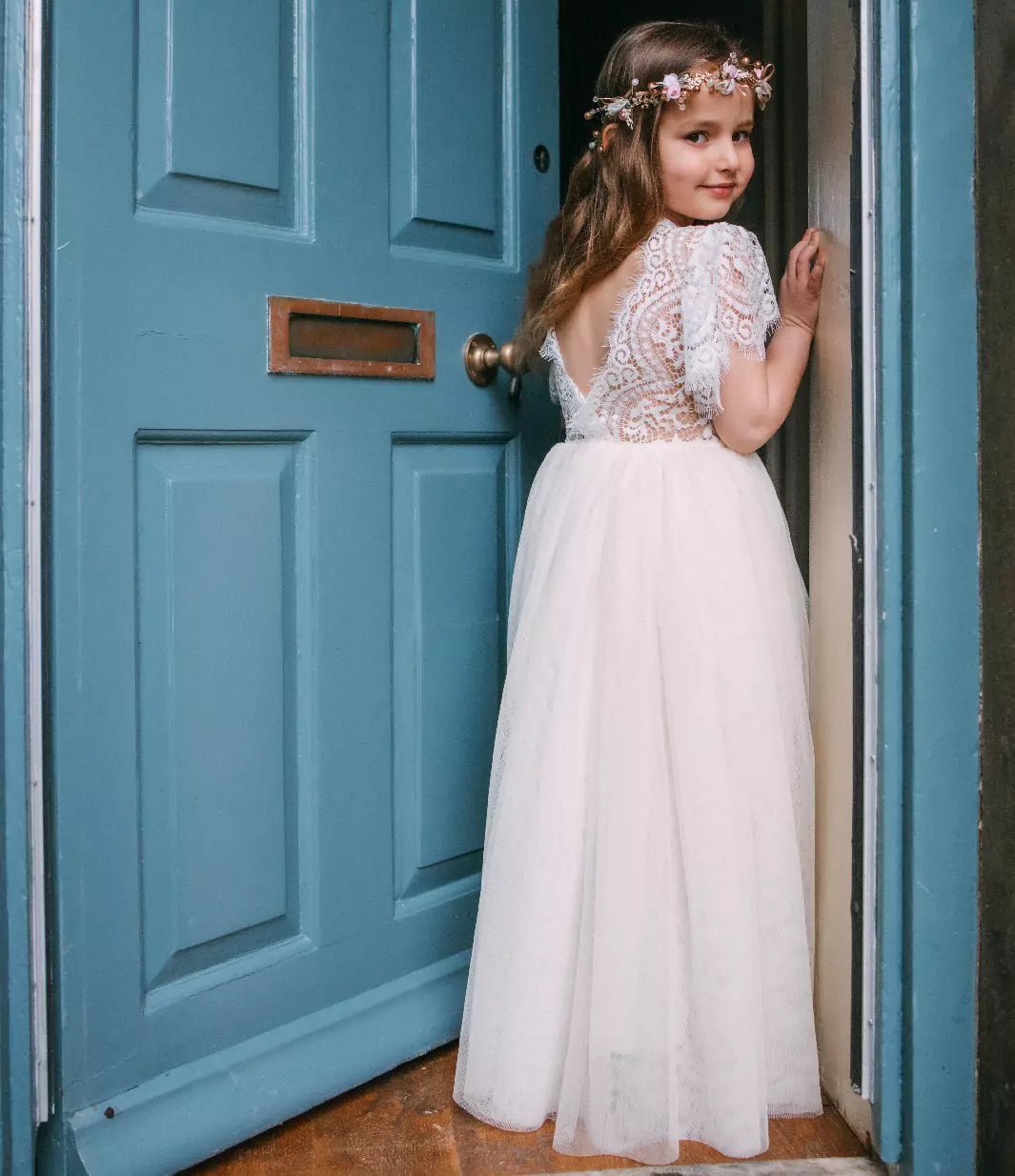 young girl in doorway