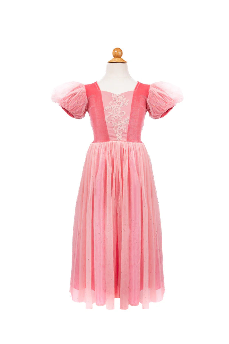 Pink dress on a mannequin against a white background