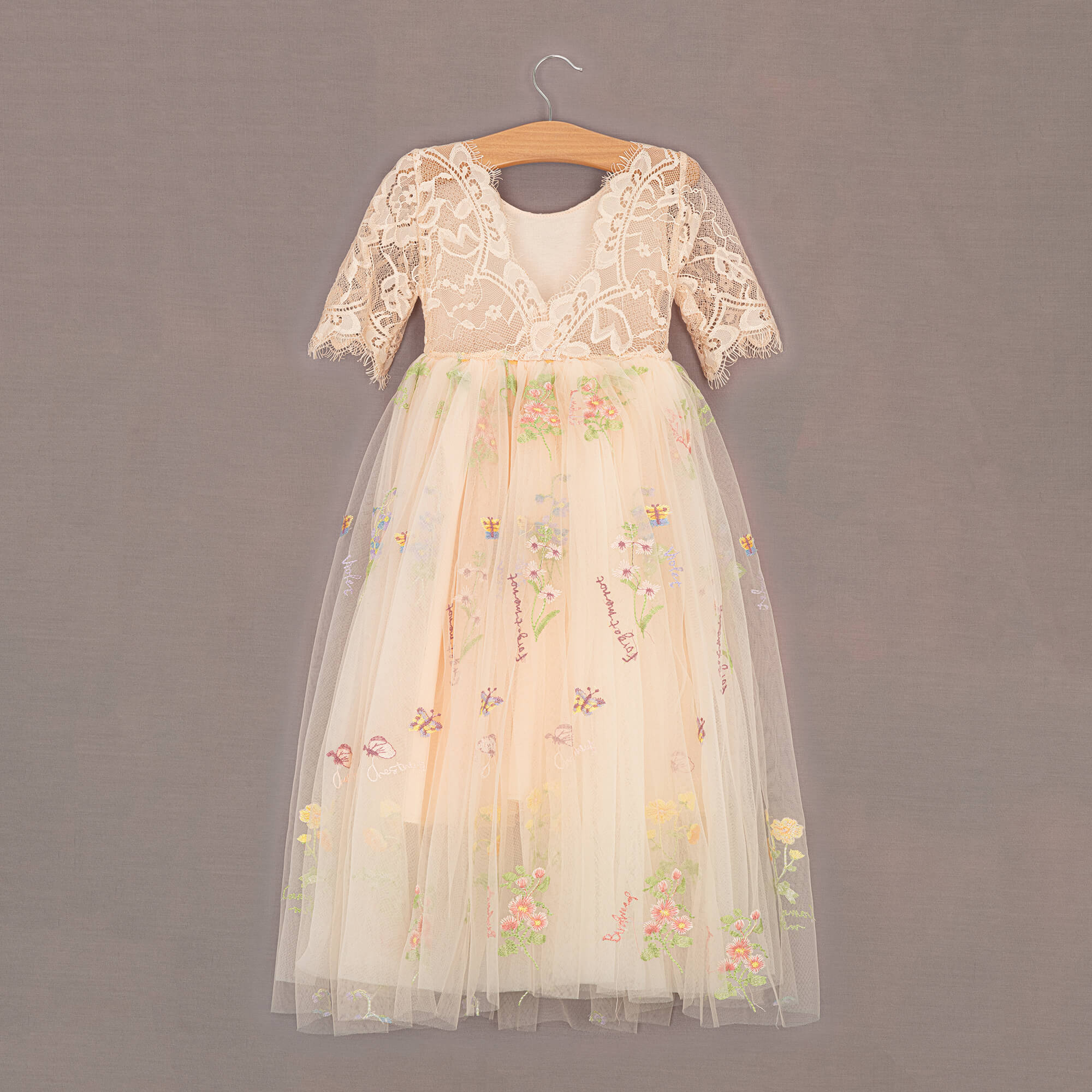 Apricot dress with embroidery detail