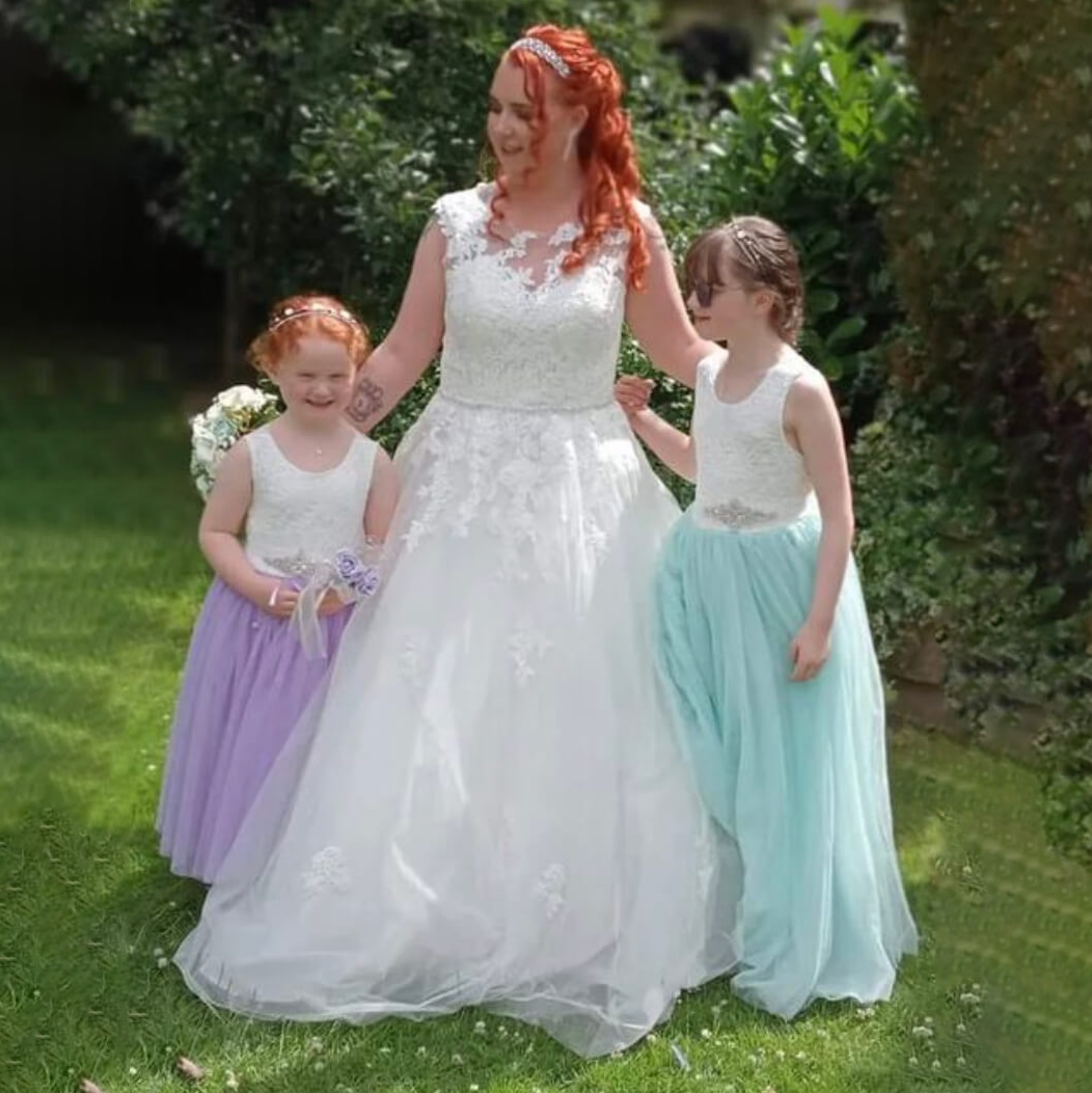 Beautiful photograph of bride and flower girls