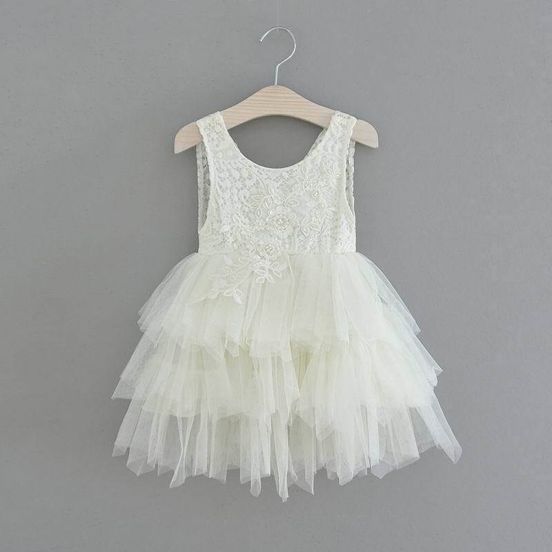 Baby Ivory Dress with a pretty sequin pattern
