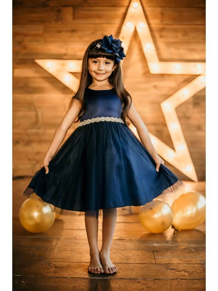 Girl holding party dress