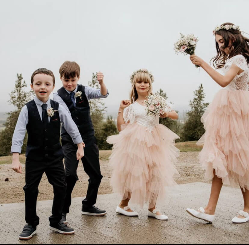 Children playing at a wedding
