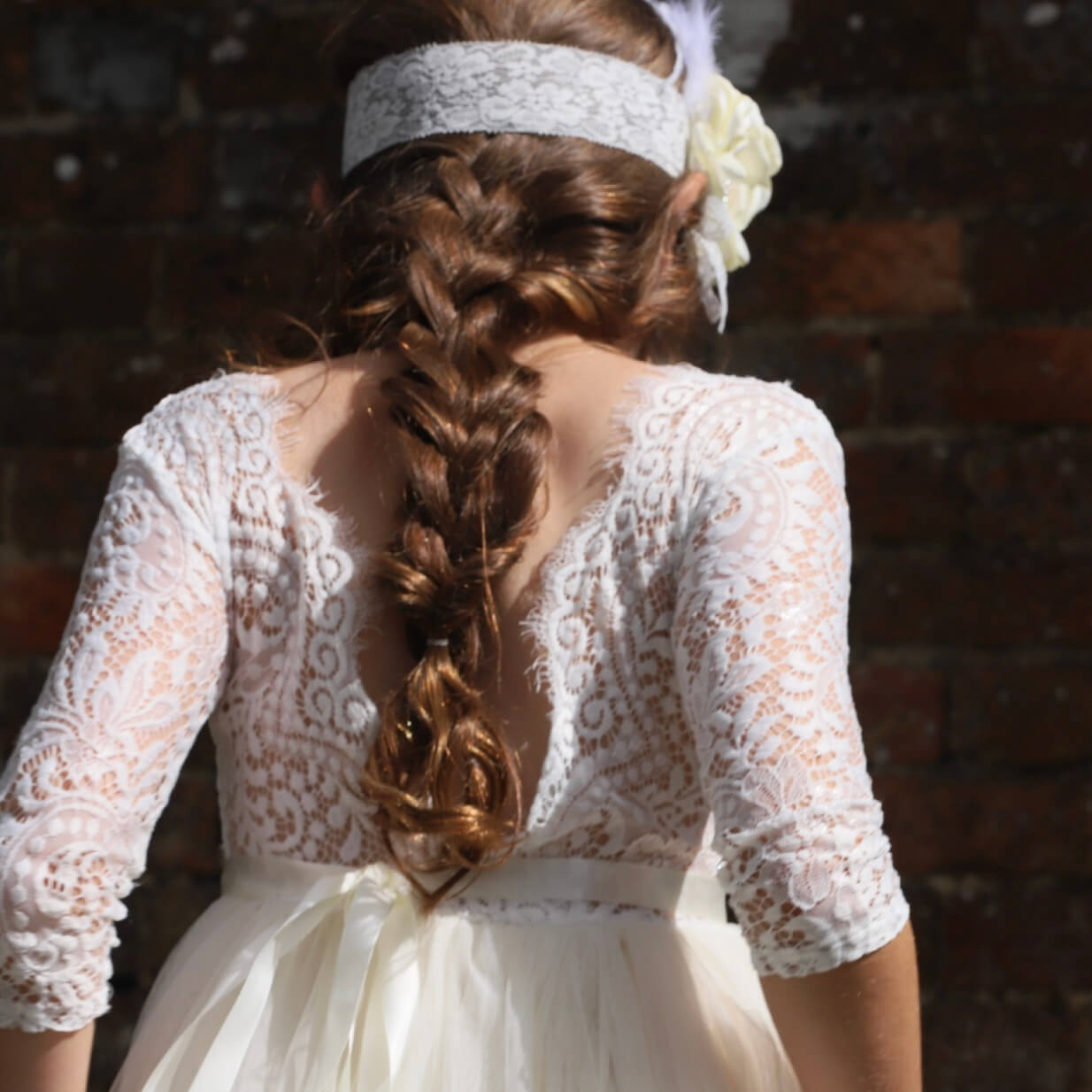 Back detailing of dress and hair