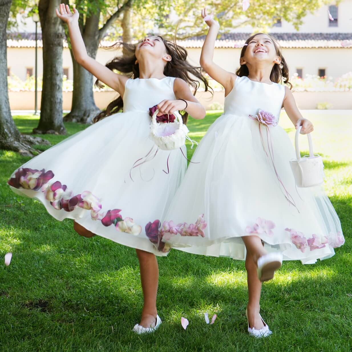 Girls in a garden wearing white stain dresses from The Fairy Princess