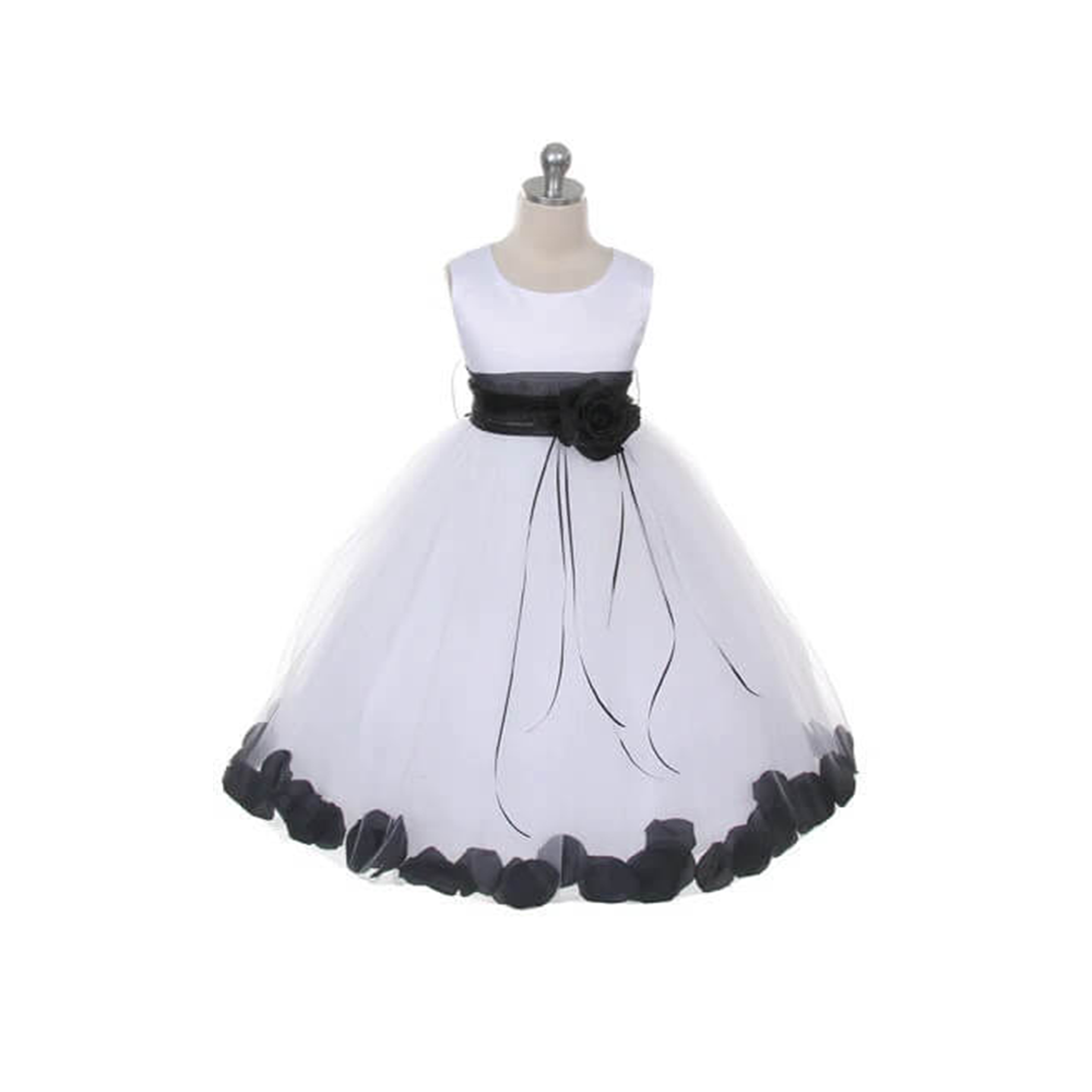 white dress with black petals and sash