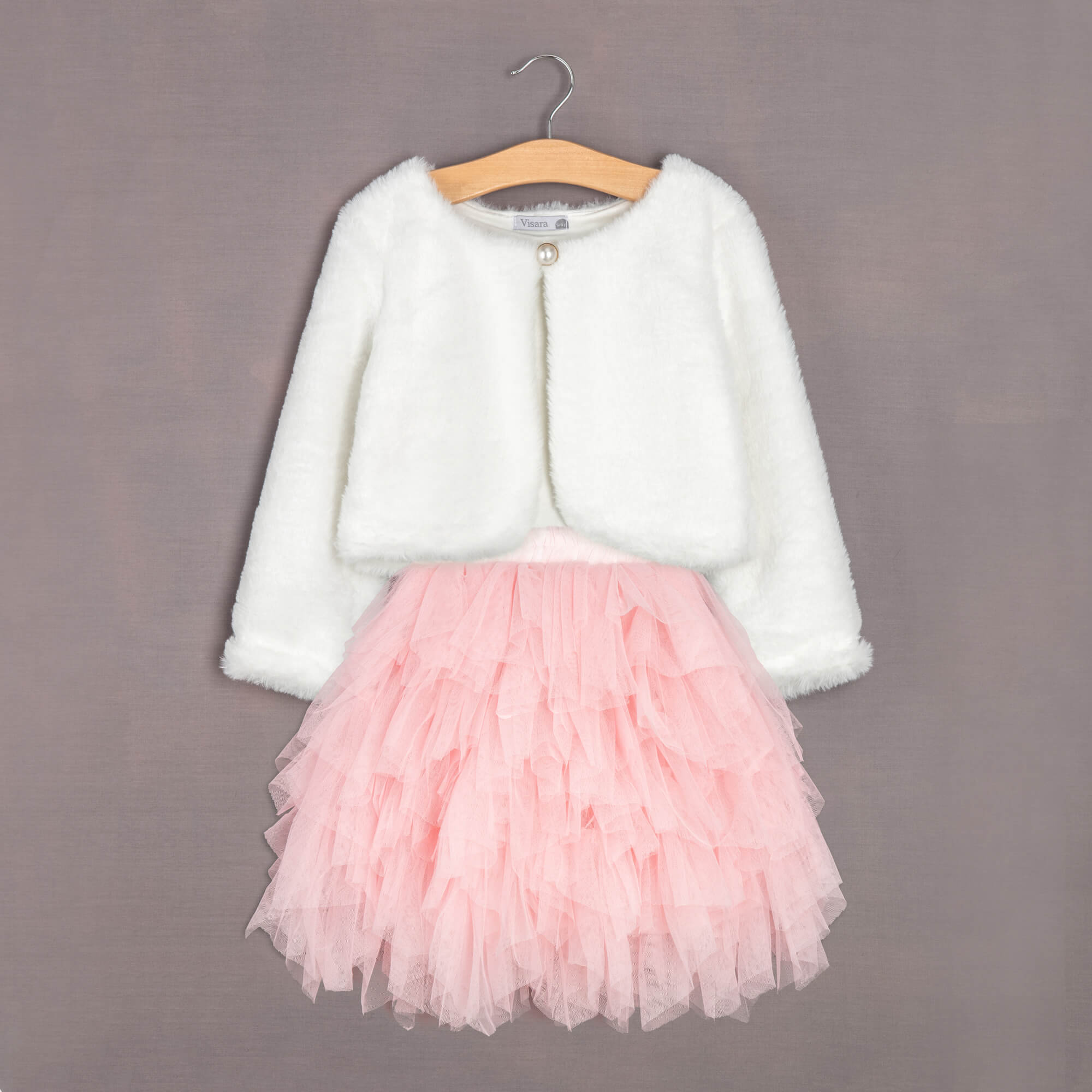 skirt worn with our faux fur bolero on hanger 