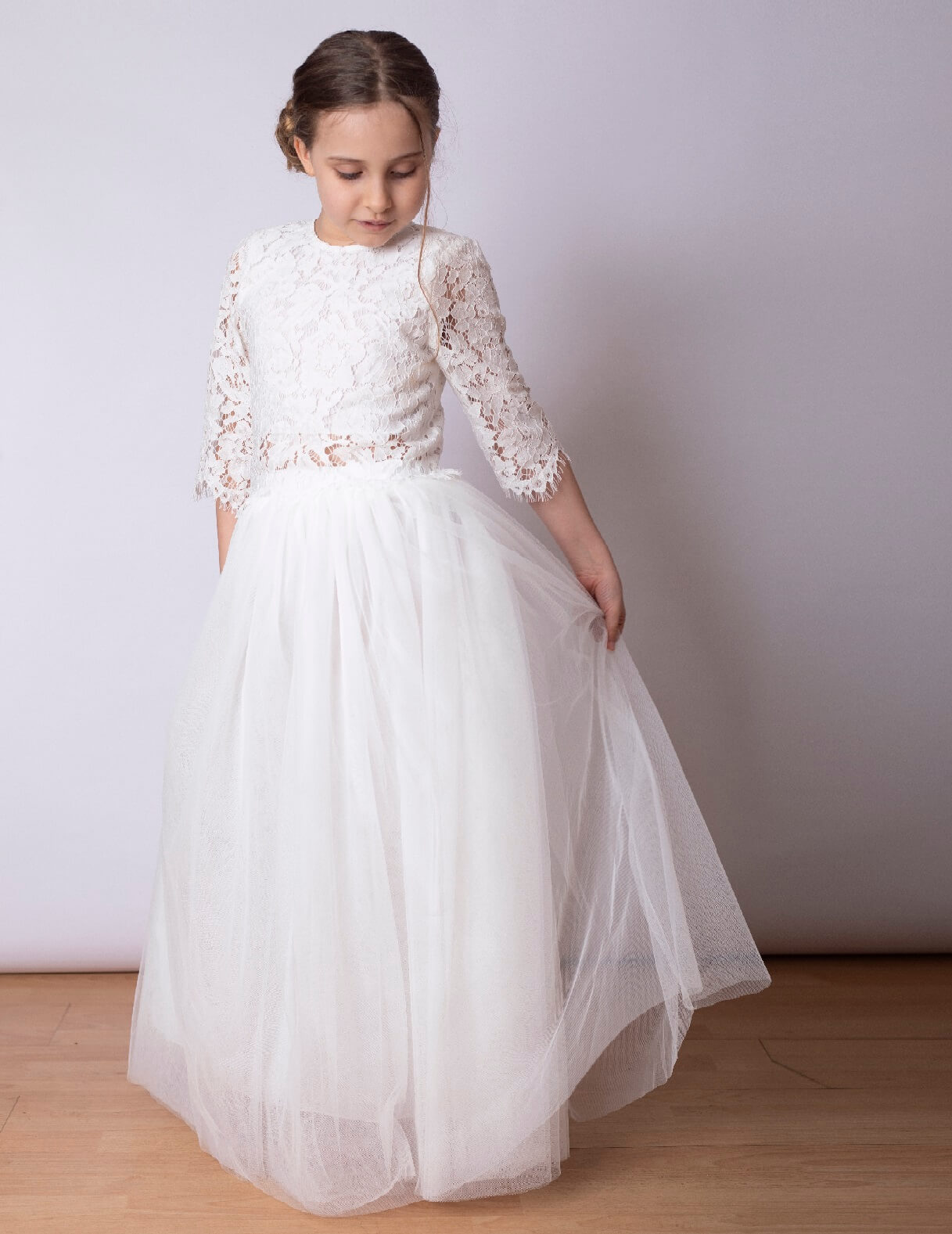 White Lace top and skirt worn by model