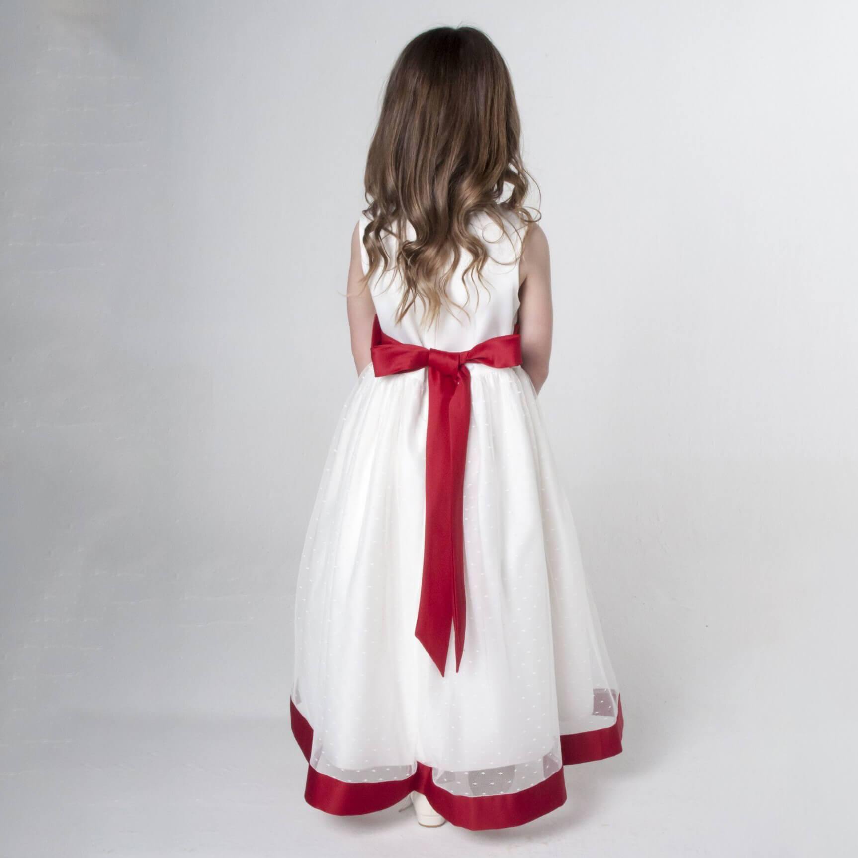 Girl in white and red flower girl dress