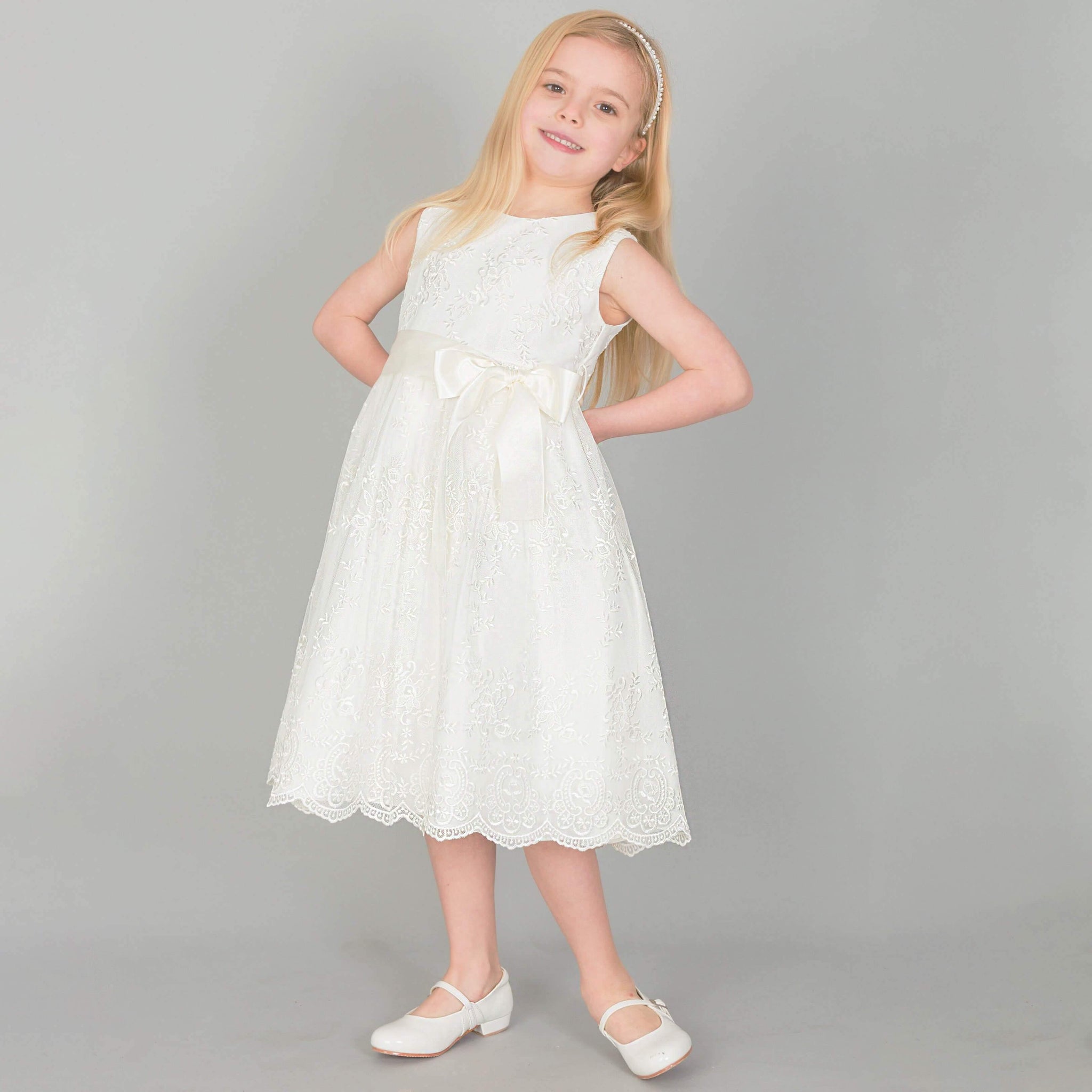 Girl in ivory party dress