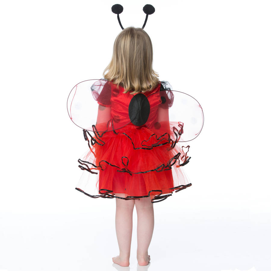 Girl wearing a red and black Ladybug costume  Edit alt text